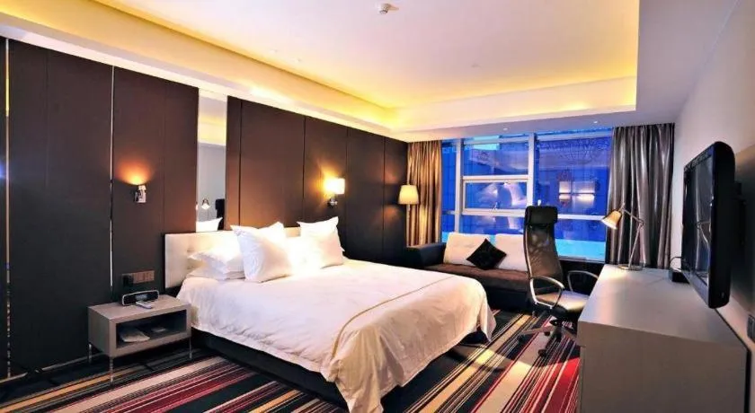 Bed in Urumqi Bayinhe Hotel