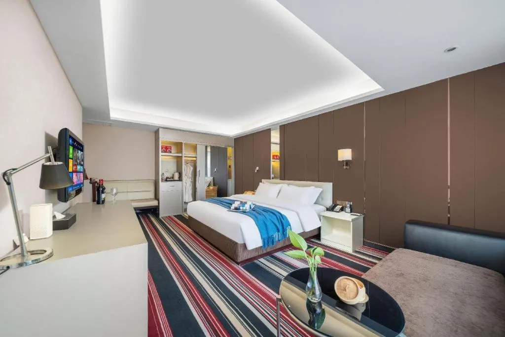 Bed in Urumqi Bayinhe Hotel