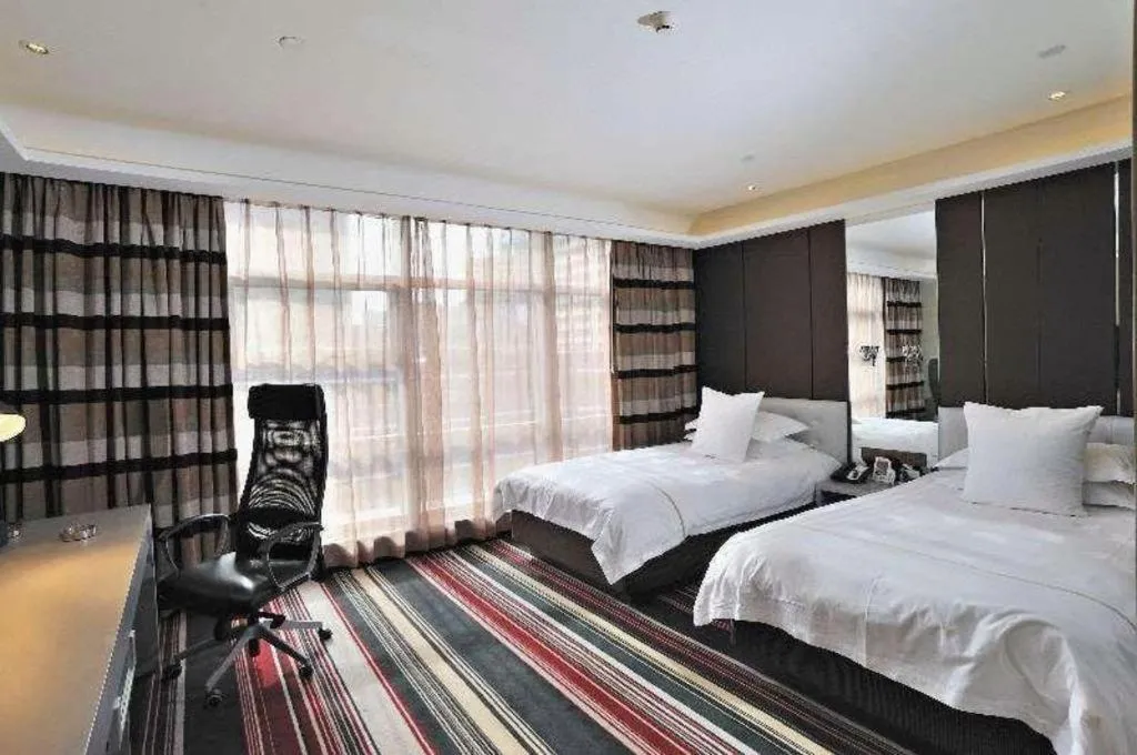 Bed in Urumqi Bayinhe Hotel