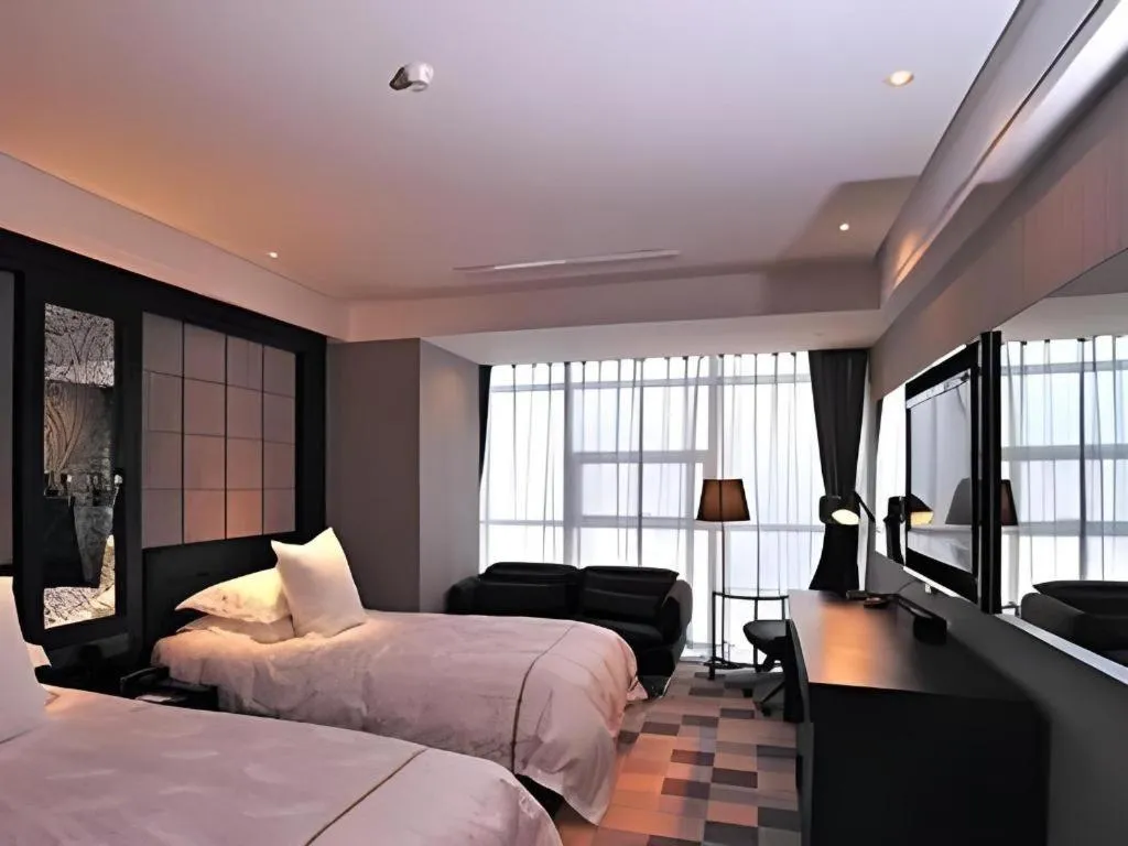 Bed in Urumqi Bayinhe Hotel