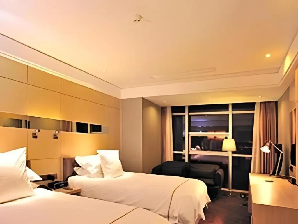 Bed in Urumqi Bayinhe Hotel