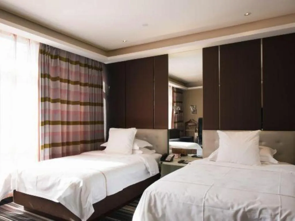 Bed in Urumqi Bayinhe Hotel