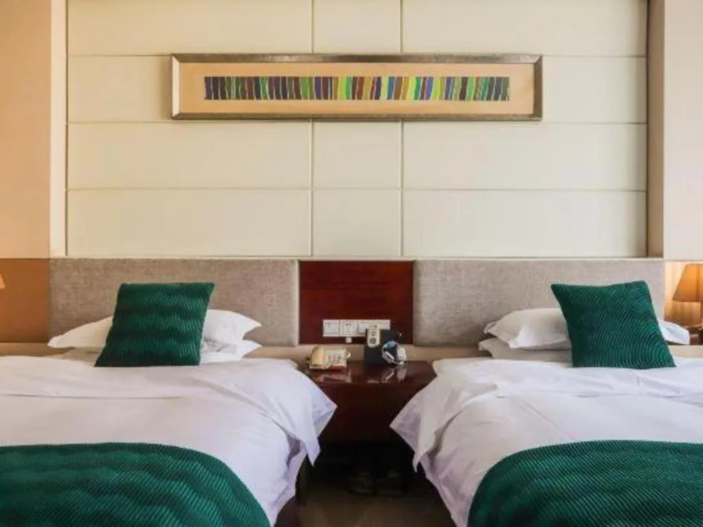 Bed in Fortune Hotel Longyan