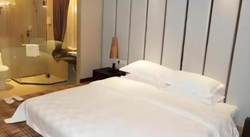 Bed in Fortune Hotel Longyan