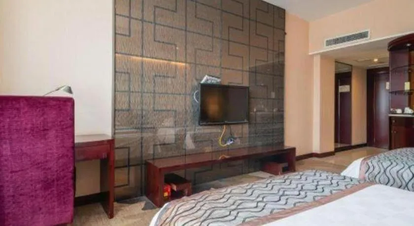 Bed in Fortune Hotel Longyan