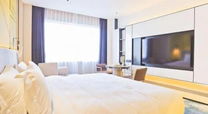 Bed in Fortune Hotel Longyan