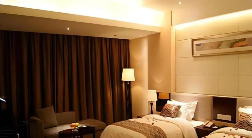 Bed in Fortune Hotel Longyan