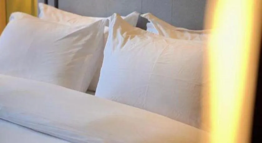 Bed in Fortune Hotel Longyan