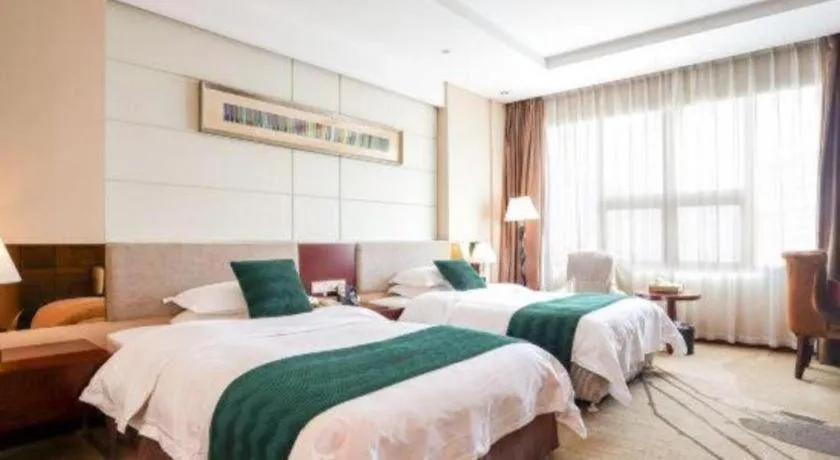 Bed in Fortune Hotel Longyan