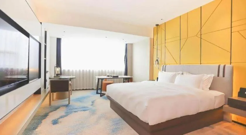 Bed in Fortune Hotel Longyan