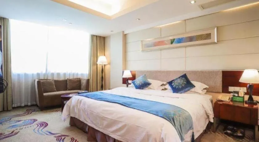 Bed in Fortune Hotel Longyan