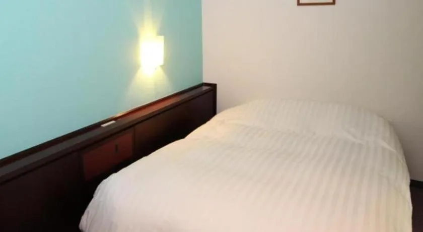 Bed in Oita Century Hotel