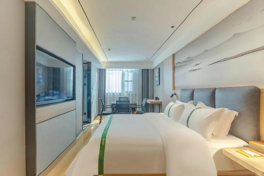 Bed in GreenTree Inn Bozhou Weiwu Road Hotel