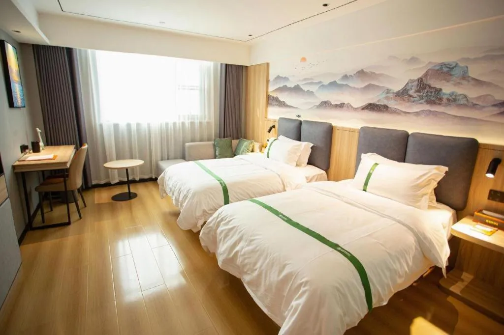 Bed in GreenTree Inn Bozhou Weiwu Road Hotel