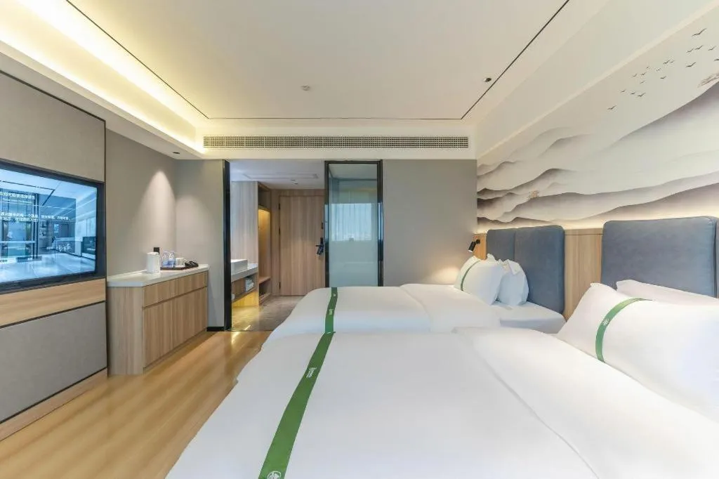 Bed in GreenTree Inn Bozhou Weiwu Road Hotel