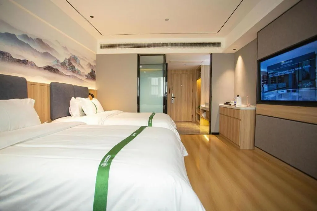 Bed in GreenTree Inn Bozhou Weiwu Road Hotel