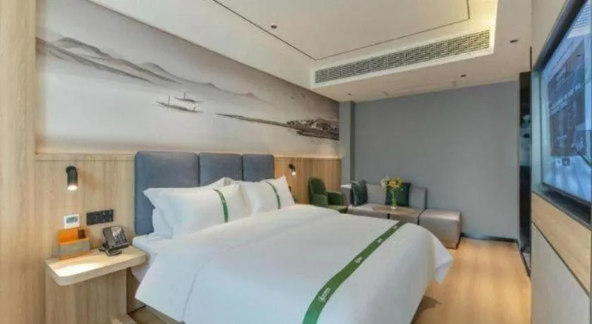 Bed in GreenTree Inn Bozhou Weiwu Road Hotel
