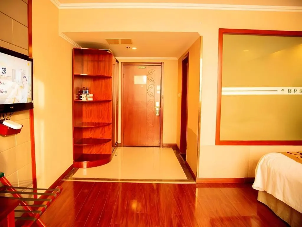 Bed in GreenTree Inn Bozhou Weiwu Road Hotel