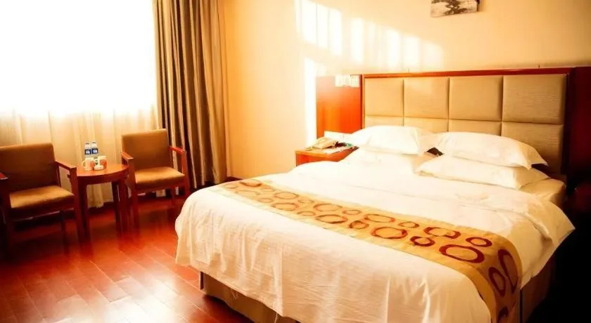 Bed in GreenTree Inn Bozhou Weiwu Road Hotel