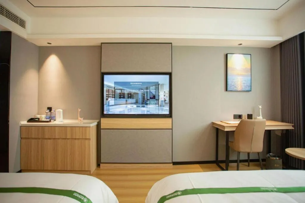 Bed in GreenTree Inn Bozhou Weiwu Road Hotel