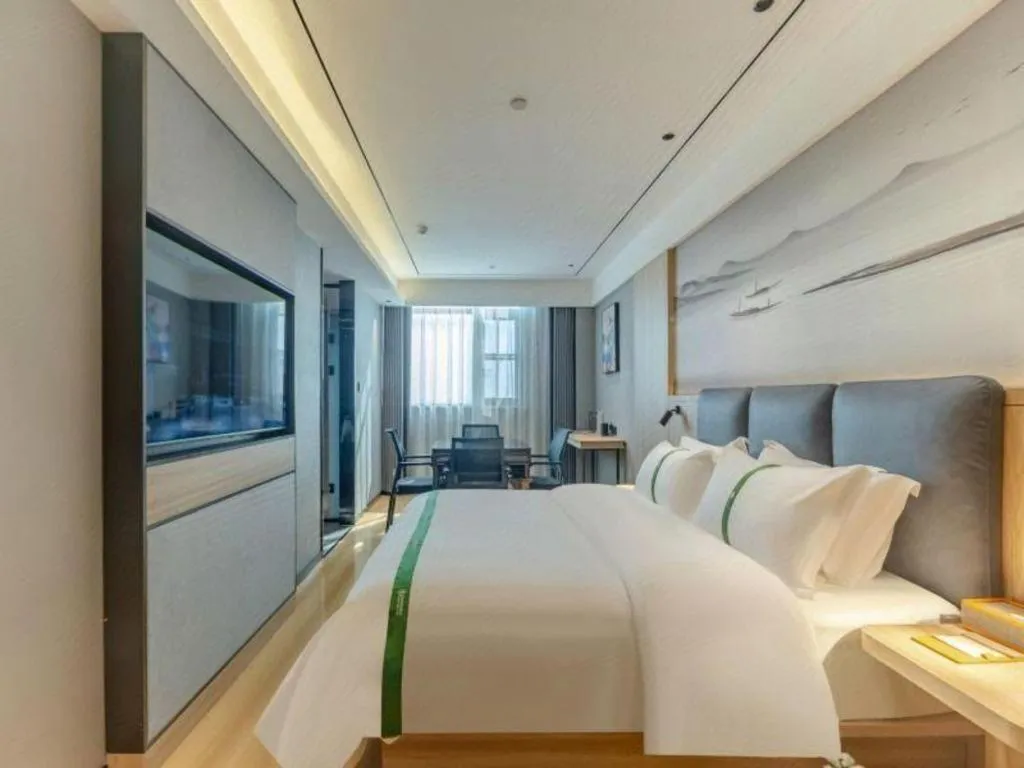 Bed in GreenTree Inn Bozhou Weiwu Road Hotel