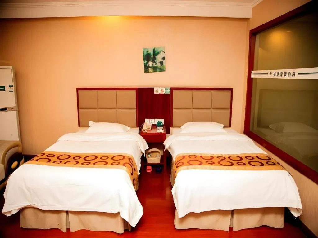 Bed in GreenTree Inn Bozhou Weiwu Road Hotel