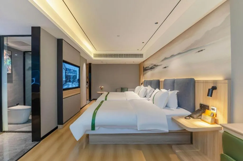 Bed in GreenTree Inn Bozhou Weiwu Road Hotel