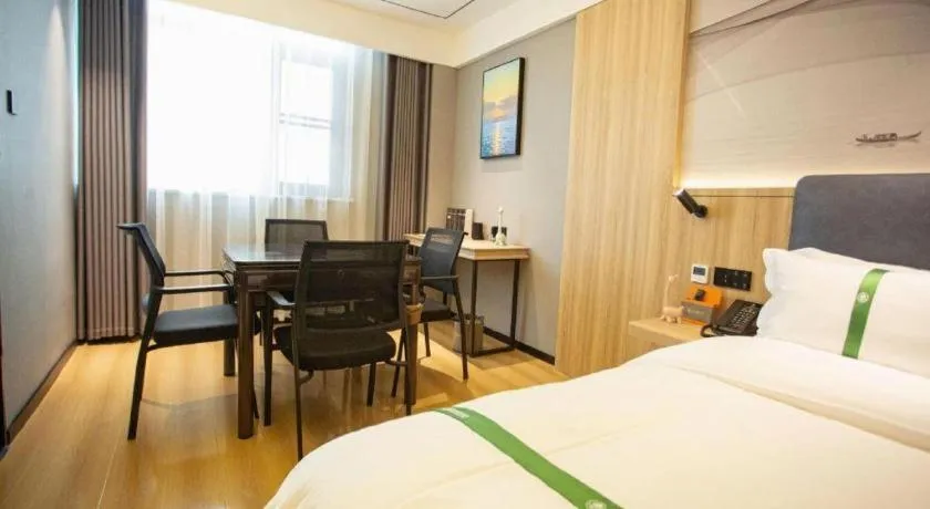 Bed in GreenTree Inn Bozhou Weiwu Road Hotel