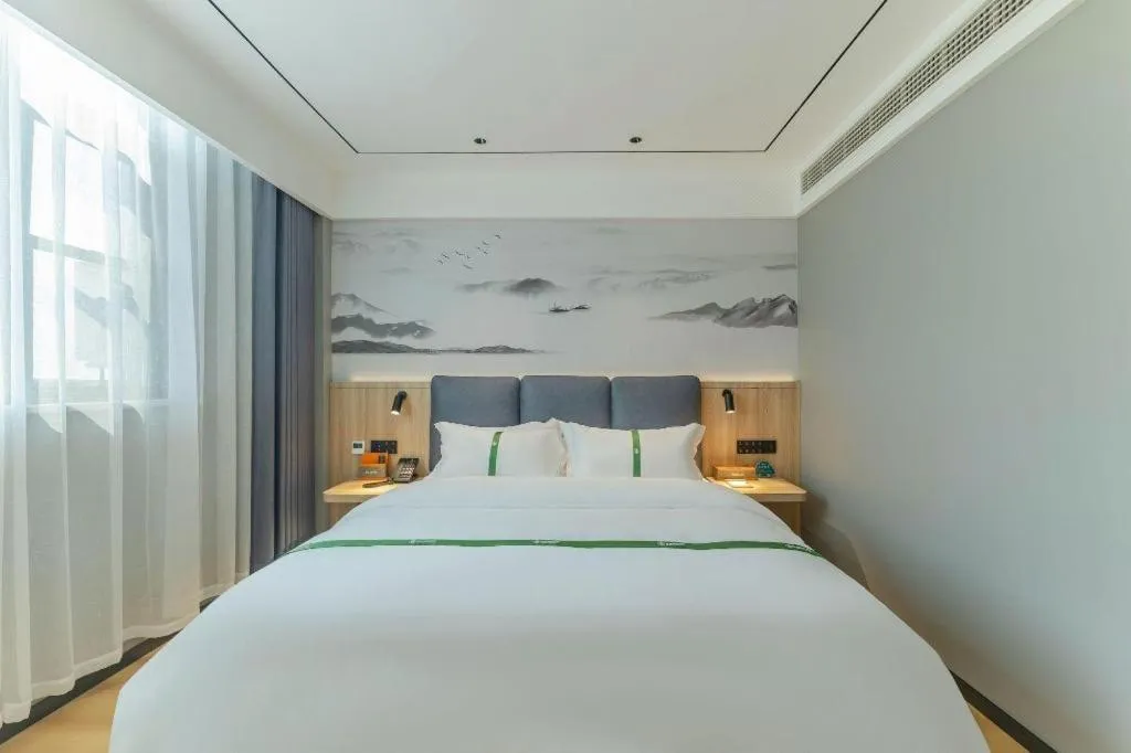 Bed in GreenTree Inn Bozhou Weiwu Road Hotel