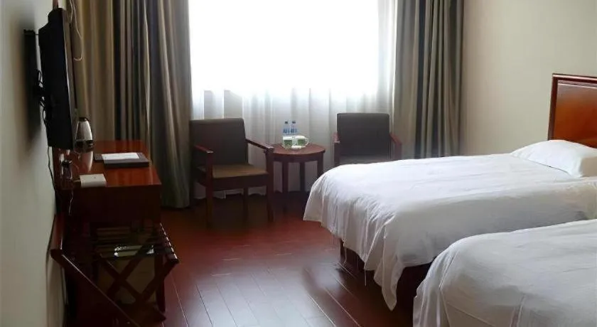 Bed in GreenTree Inn Bozhou Weiwu Road Hotel