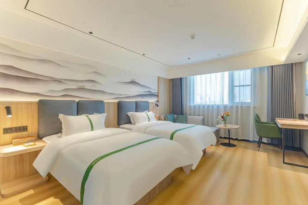Bed in GreenTree Inn Bozhou Weiwu Road Hotel
