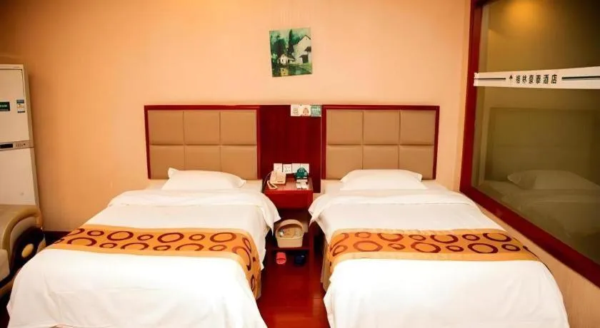 Bed in GreenTree Inn Bozhou Weiwu Road Hotel