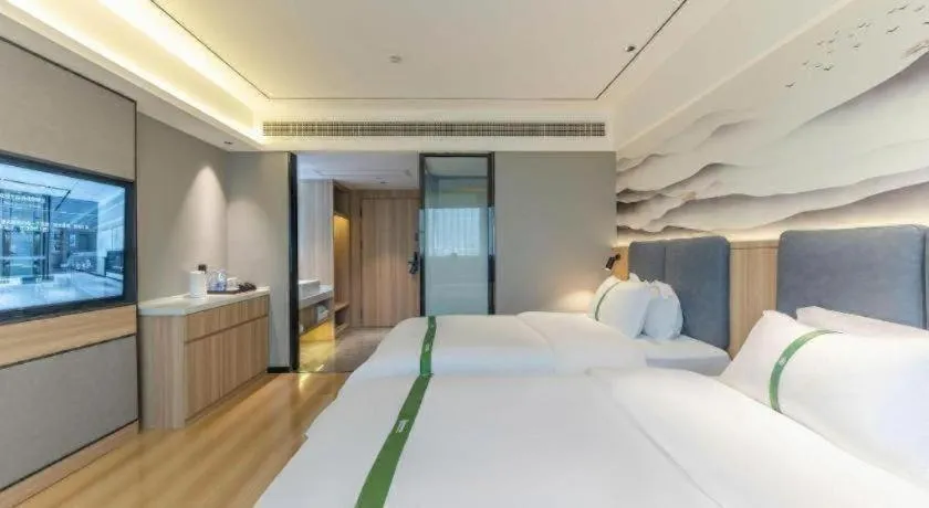 Bed in GreenTree Inn Bozhou Weiwu Road Hotel
