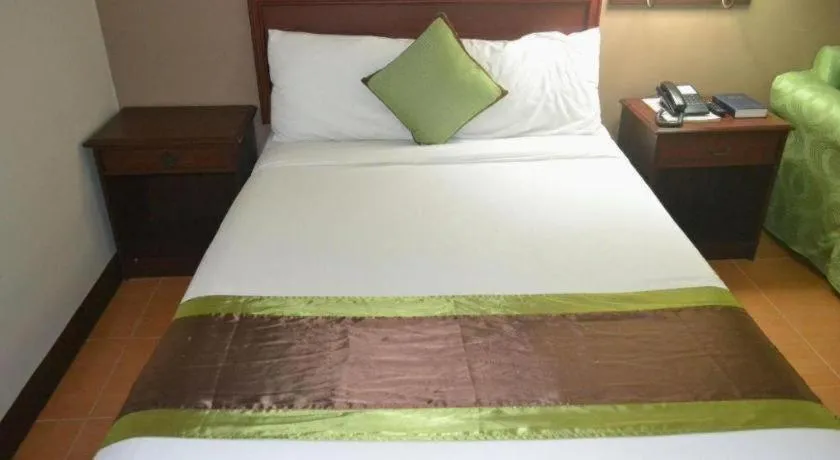 Bed in East Asia Royale Hotel