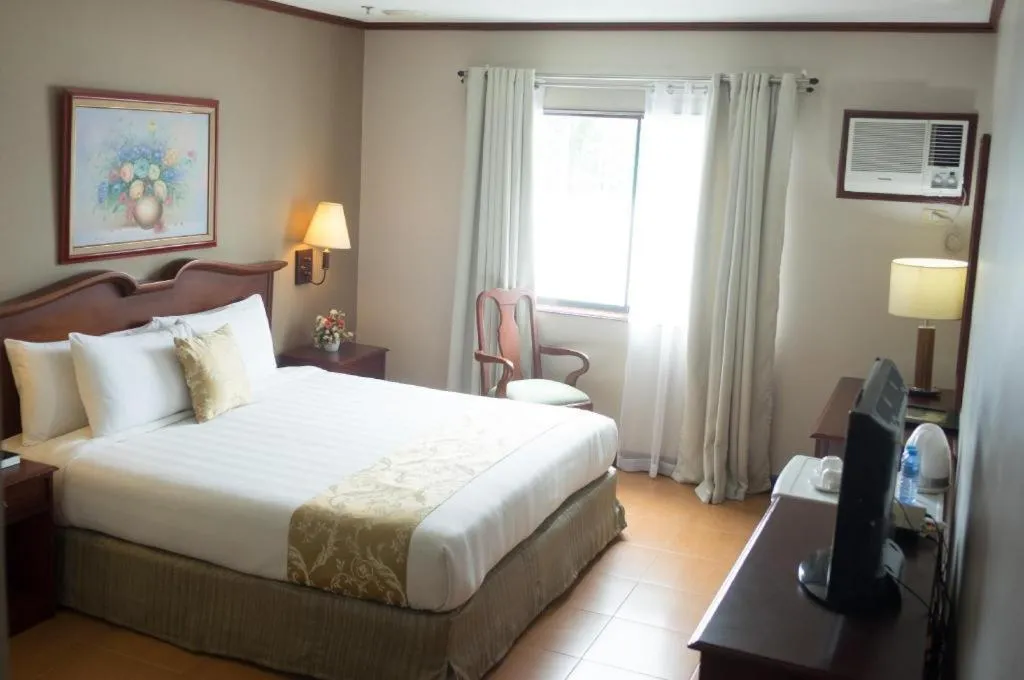 Bed in East Asia Royale Hotel