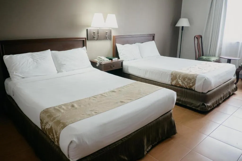 Bed in East Asia Royale Hotel