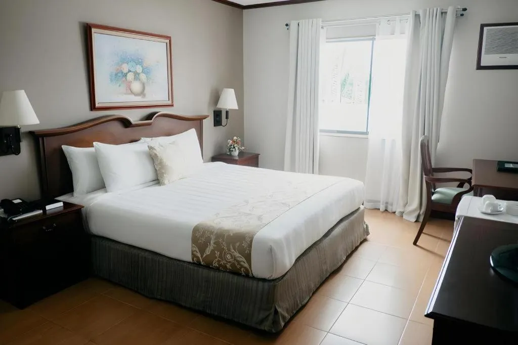 Bed in East Asia Royale Hotel