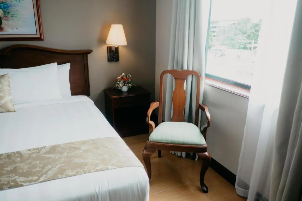 Bed in East Asia Royale Hotel