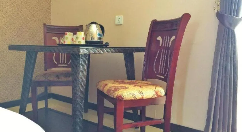 Bed in Grand Hoyah Hotel