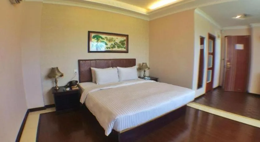 Bed in Grand Hoyah Hotel