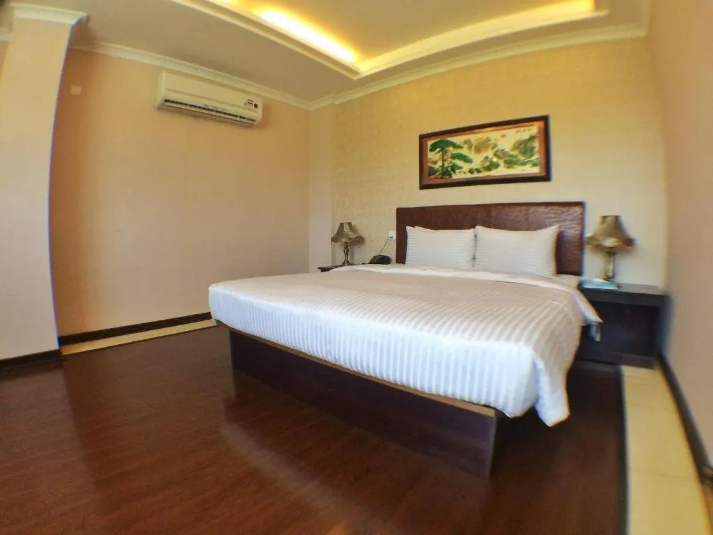 Bed in Grand Hoyah Hotel