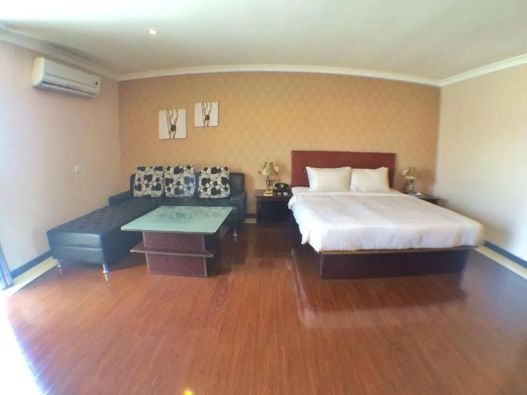 Bed in Grand Hoyah Hotel