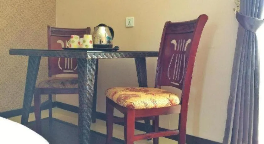 Bed in Grand Hoyah Hotel