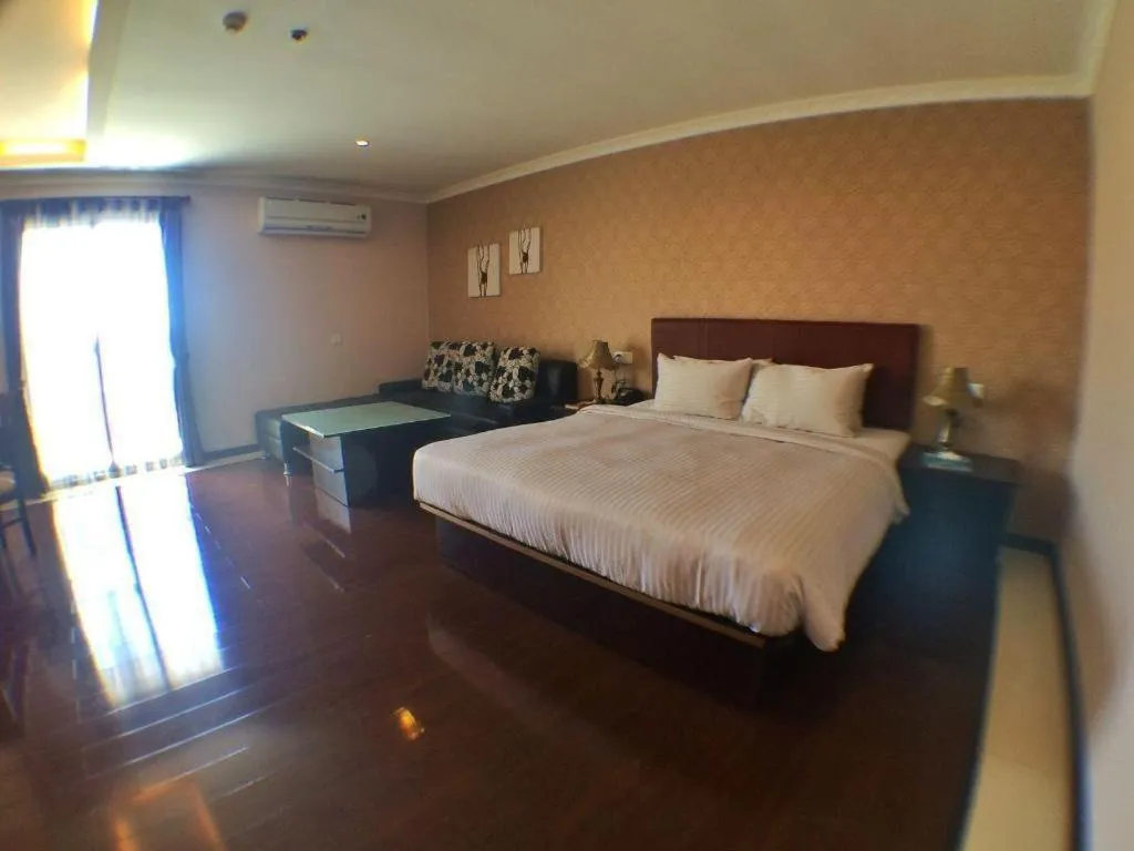 Bed in Grand Hoyah Hotel