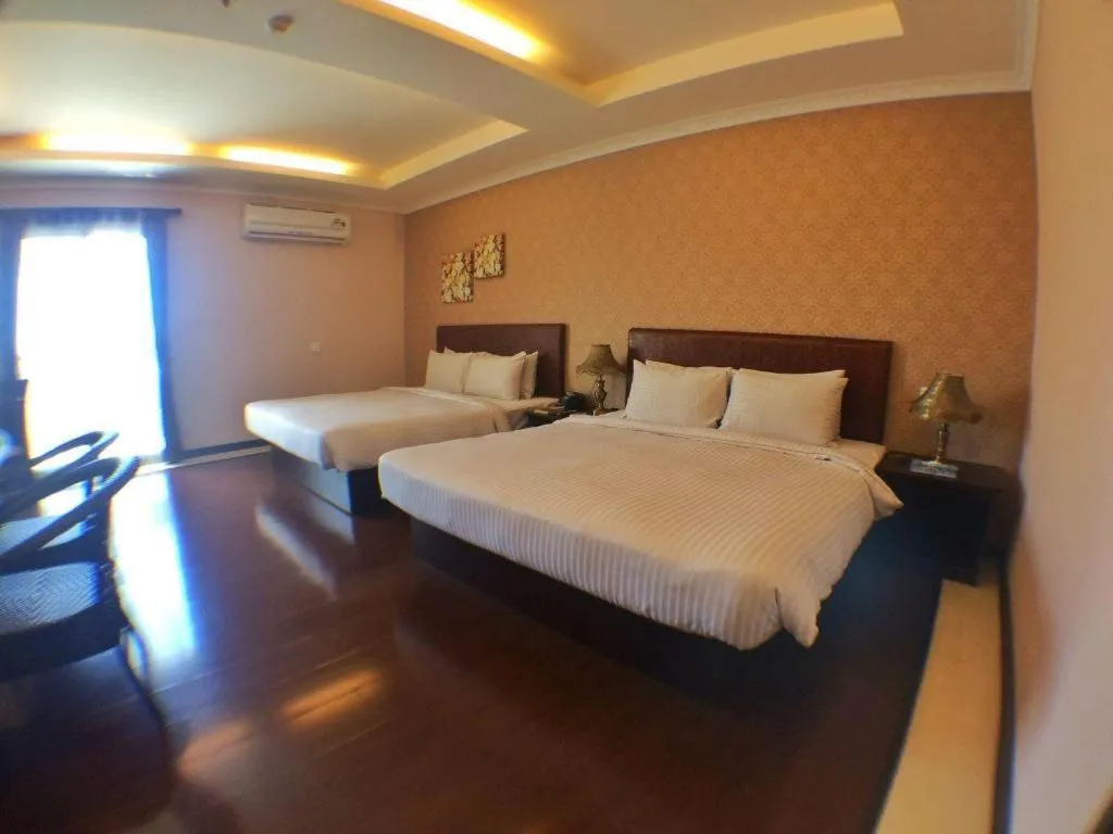 Bed in Grand Hoyah Hotel