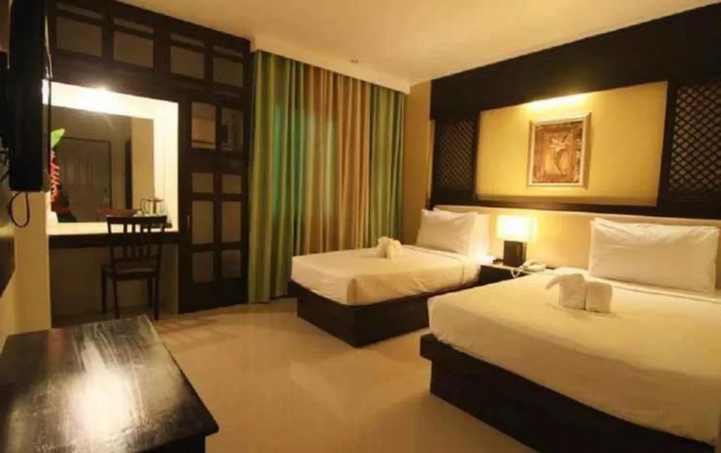 Bed in Urban Manor Hotel