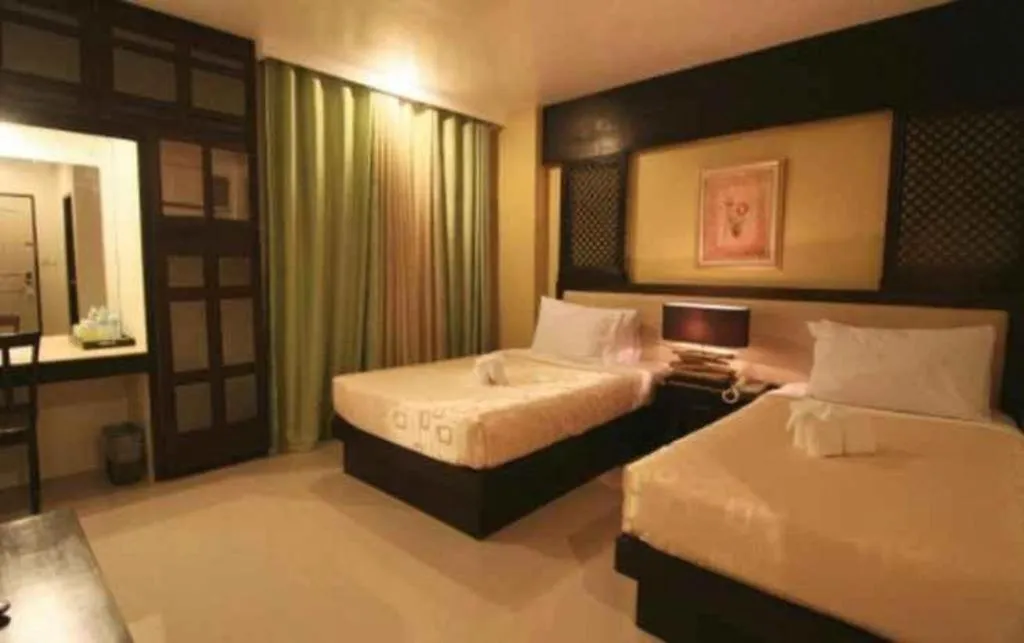 Bed in Urban Manor Hotel