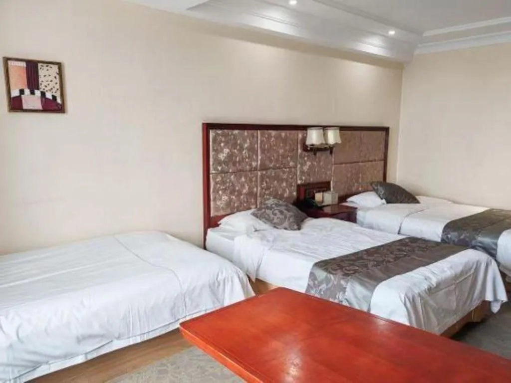 Bed in Changchun Global Hotel