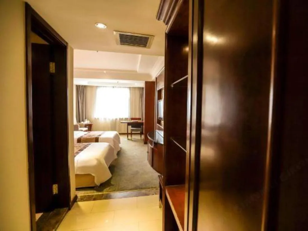 Bed in Changchun Global Hotel