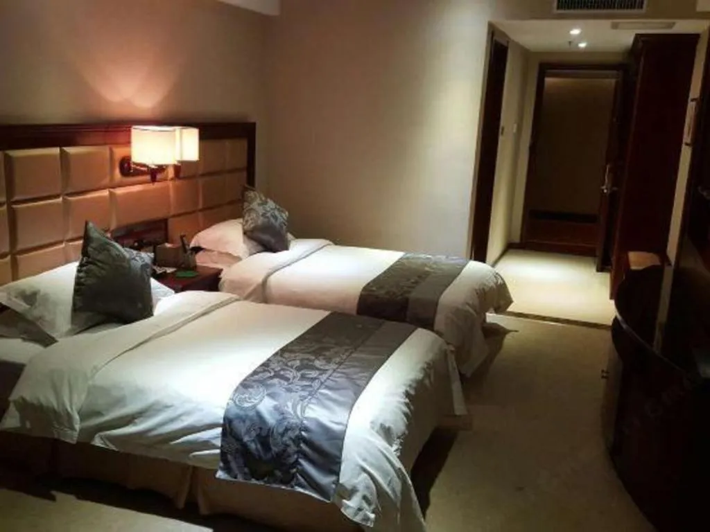 Bed in Changchun Global Hotel